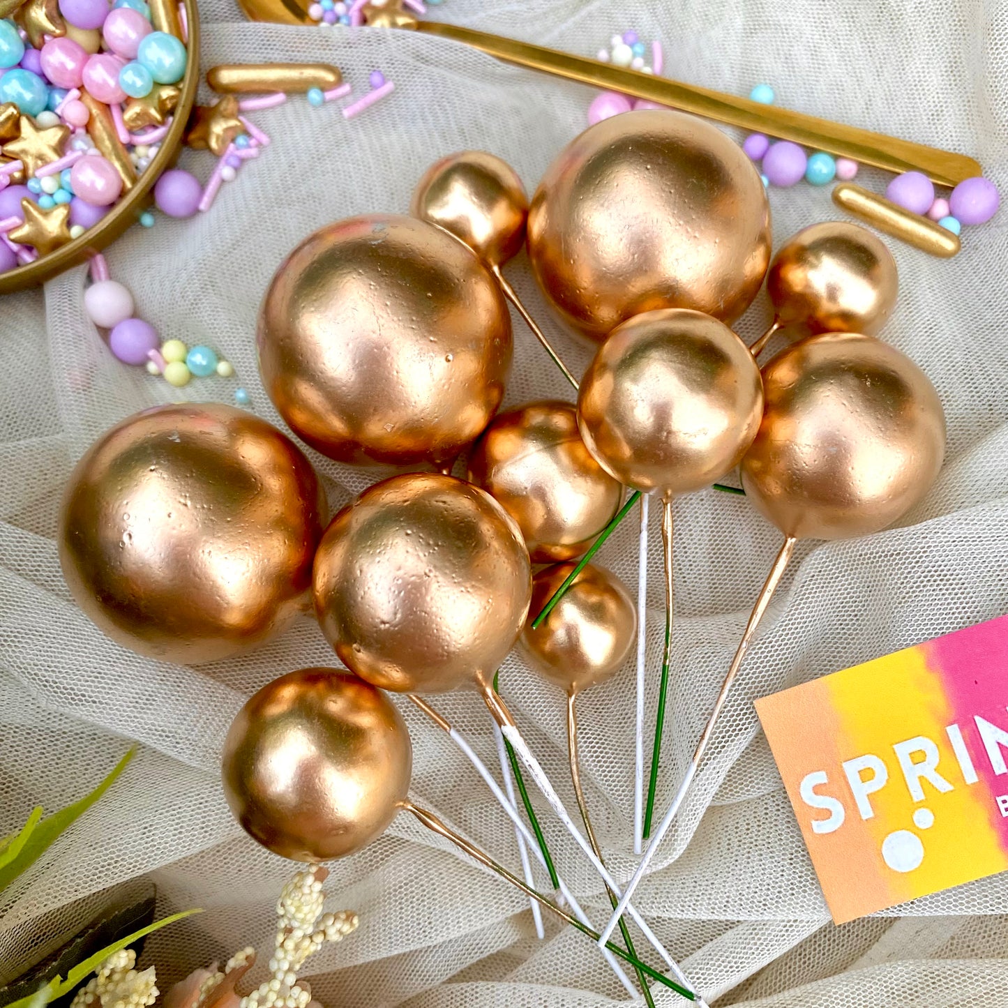 Gold balloon cake ball toppers