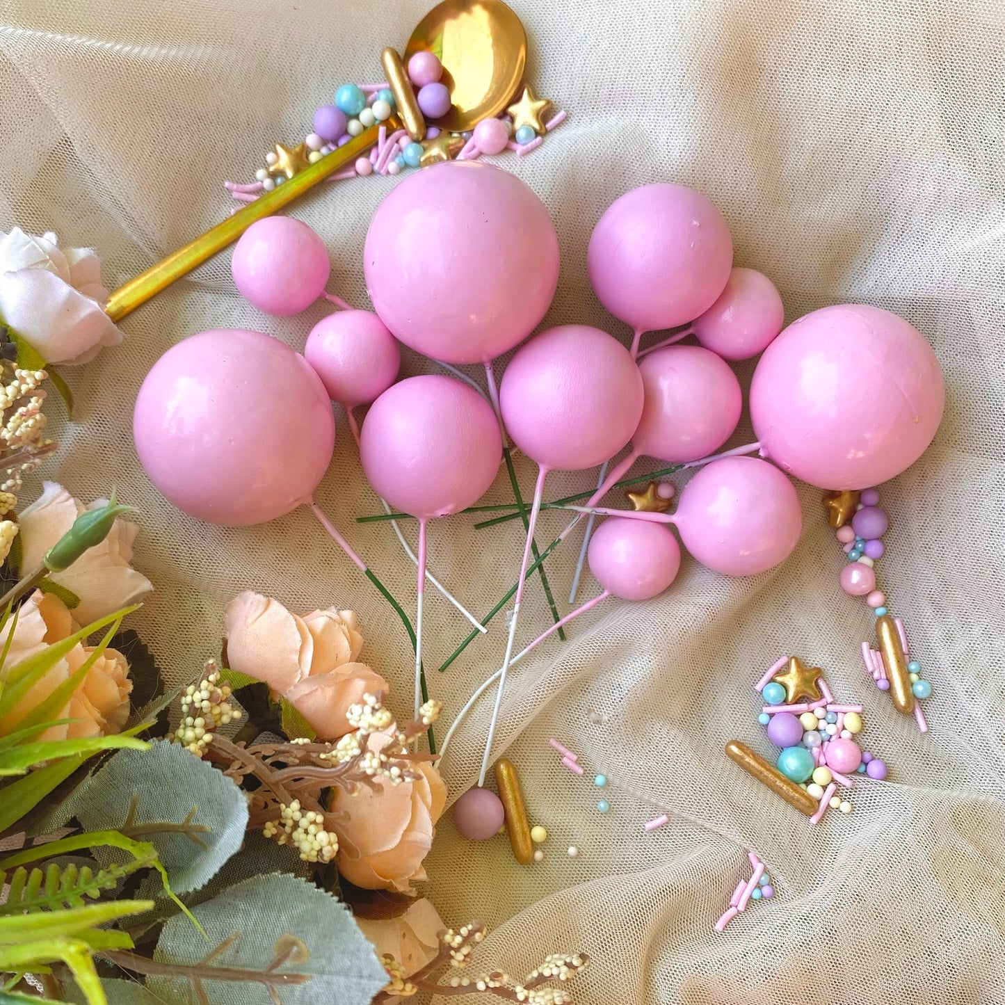 Pink balloon cake ball toppers