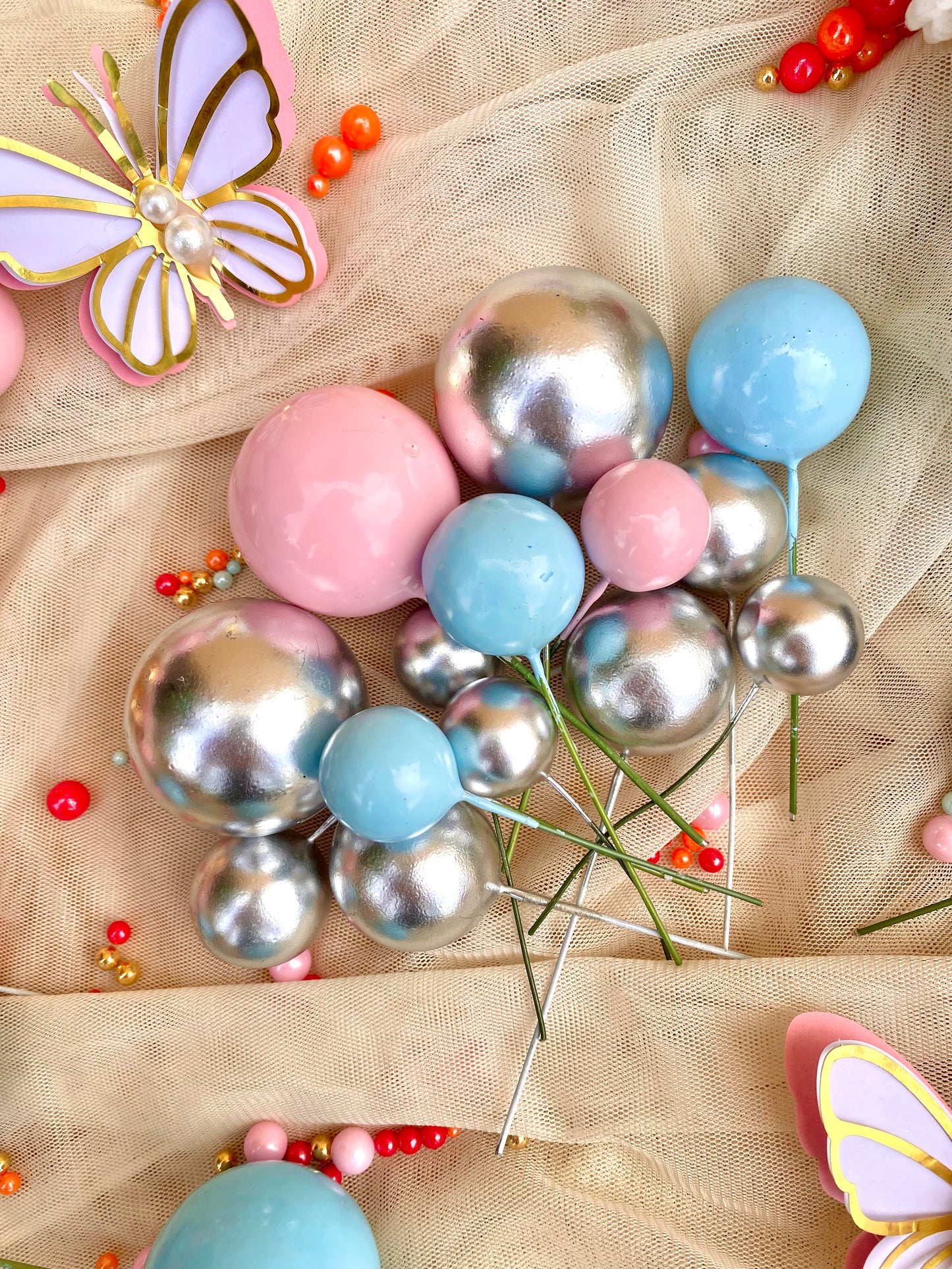 Silver balloon cake ball toppers